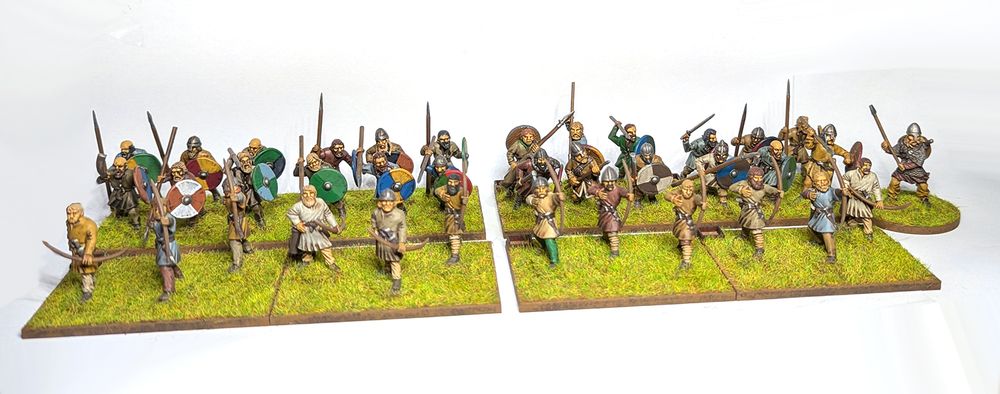 Four units of painted wargames figures