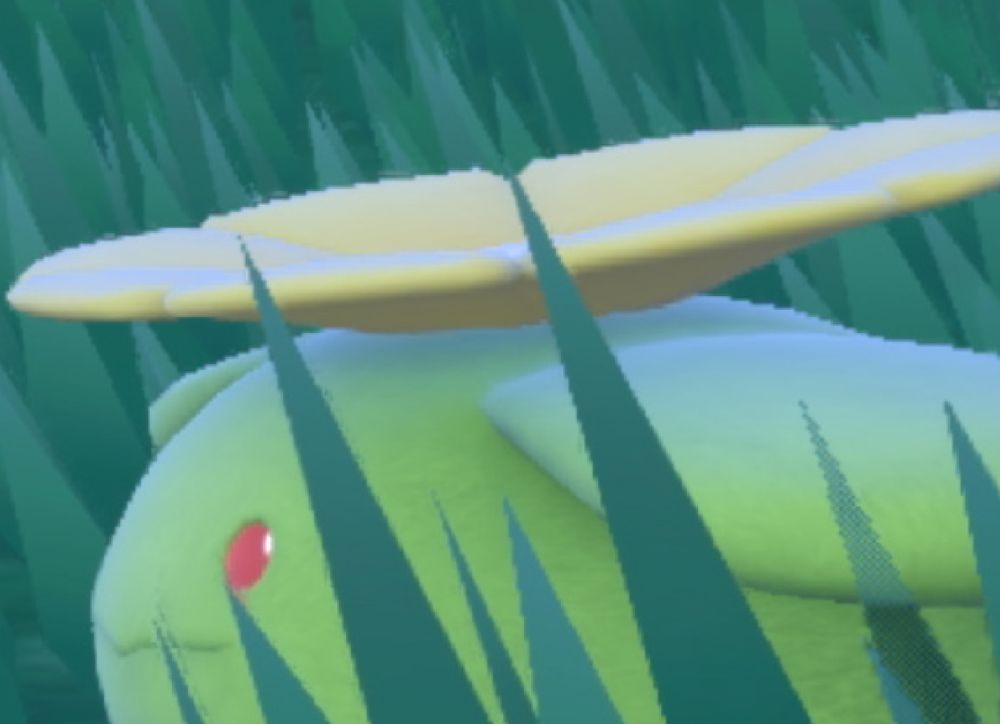 A cropped screenshot from the Korean website, showing very obvious jagged edges on a Pokémon in the grass. These edges should be smooth if it was an actual 4K screenshot.