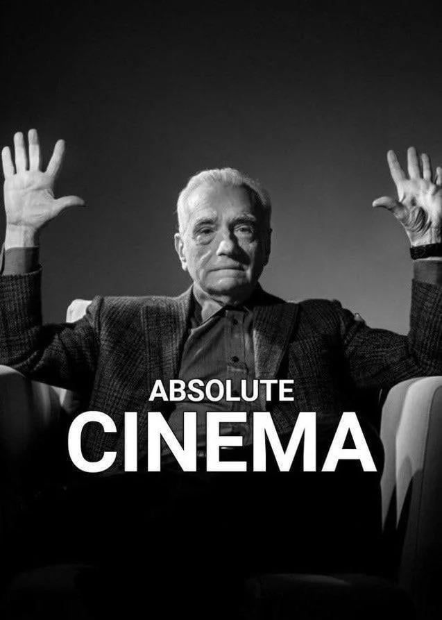 Martin Scorsese with his arms raised and palms open with the words "absolute cinema"
