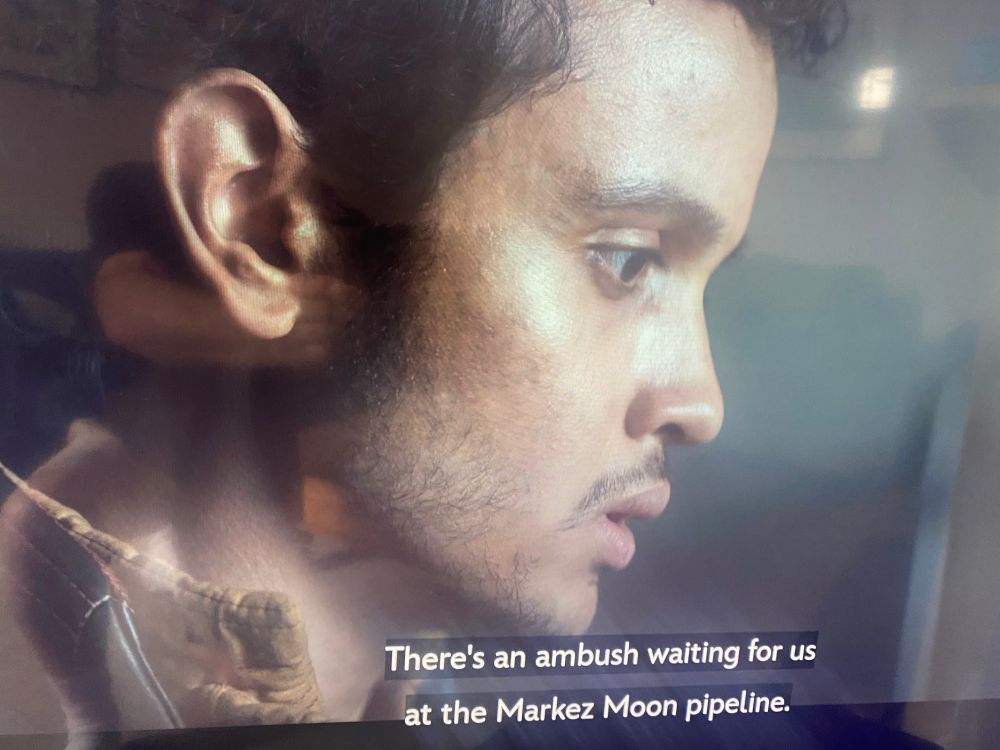 Scene from Andor with subtitle ‘There’s an ambush waiting for us at the Merkez Moon pipeline’