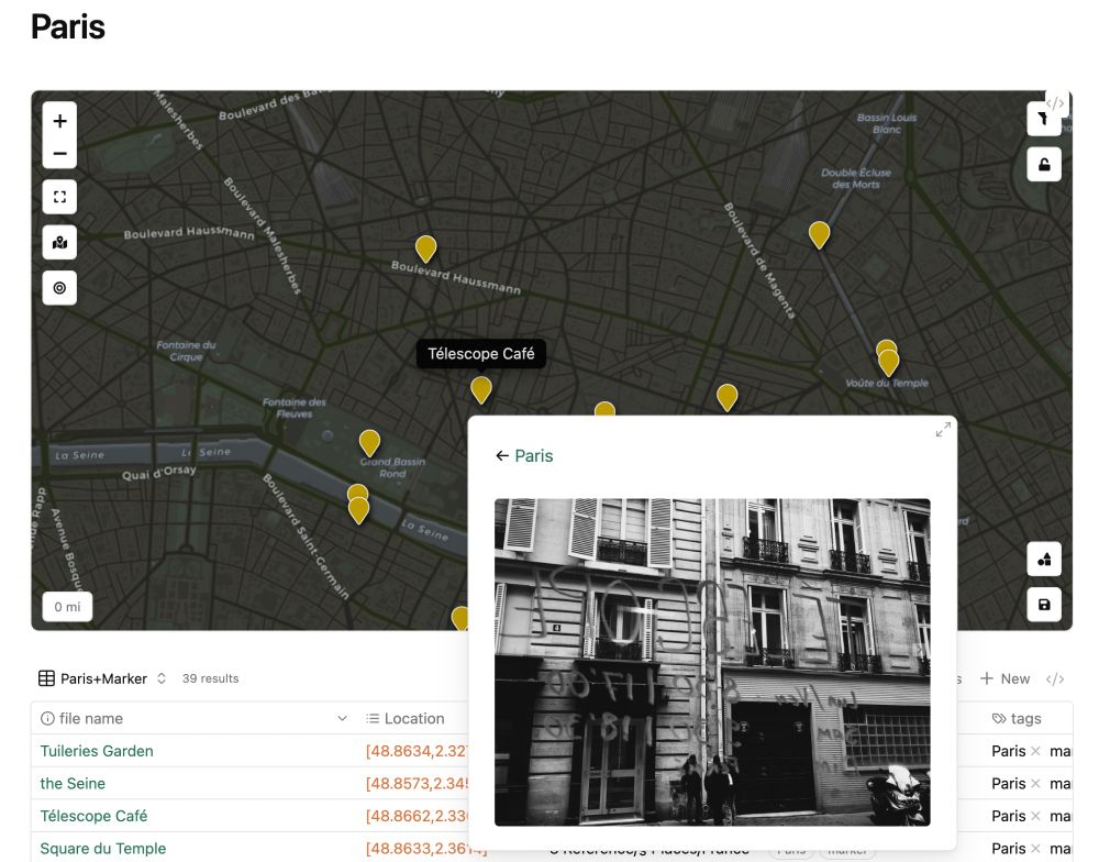 A screenshot of Obsidian app which has an embedded map of Paris with location markers around and a pop up window showing a preview of a note that includes a photo of the location (a coffeeshop window with writing on it). Below a data table of entries with their latitude / longitude data and tags.