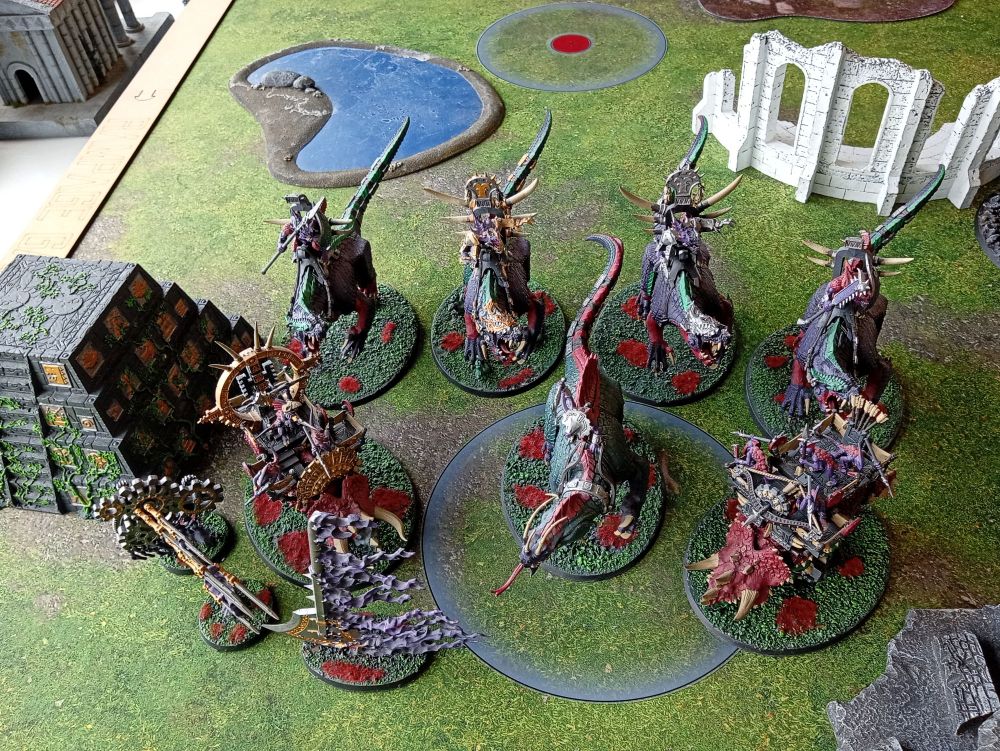 Four Old blood Carnosaurs joined by a Troglodon, Engine of the Gods, Stegadon with skystreak bow, realmshaper and aether wrought machineries. 