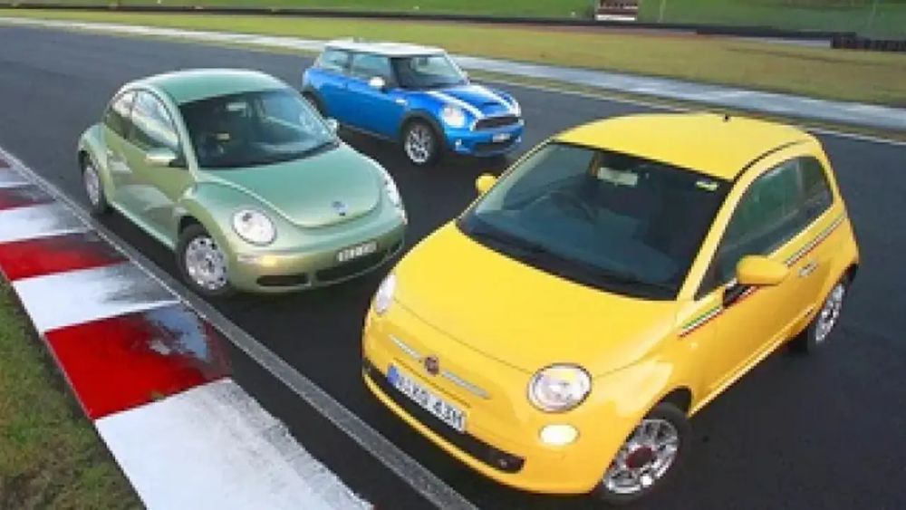 Photograph of a Volkswagen Beetle, Mini and Fiat 500. All of them are the modern versions rather than the original incarnations. 