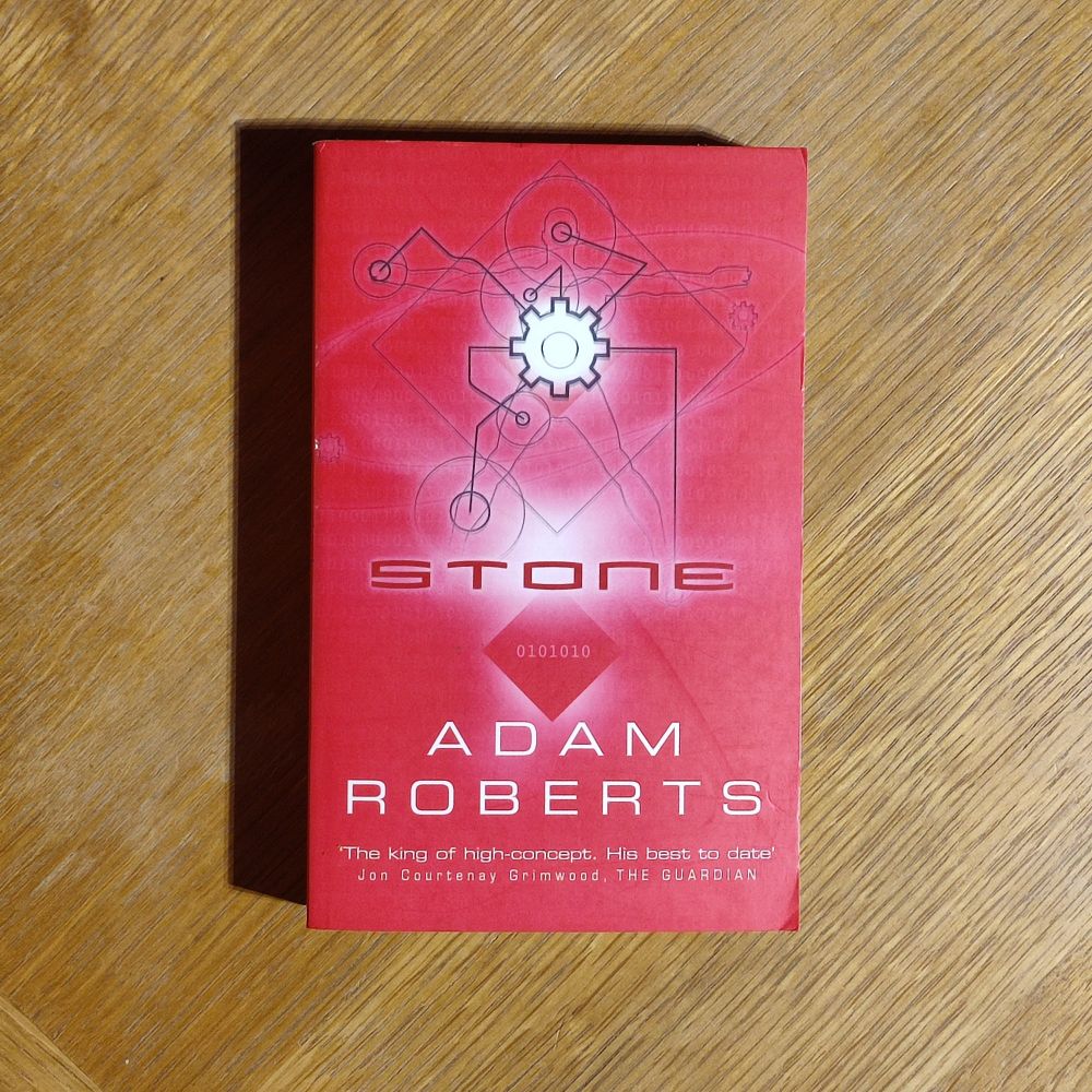 A-format paperback copy of Stone (2002) by Adam Roberts, published by Gollancz 