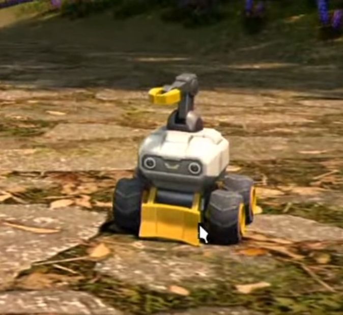 Small digger-like robot with a cute face.