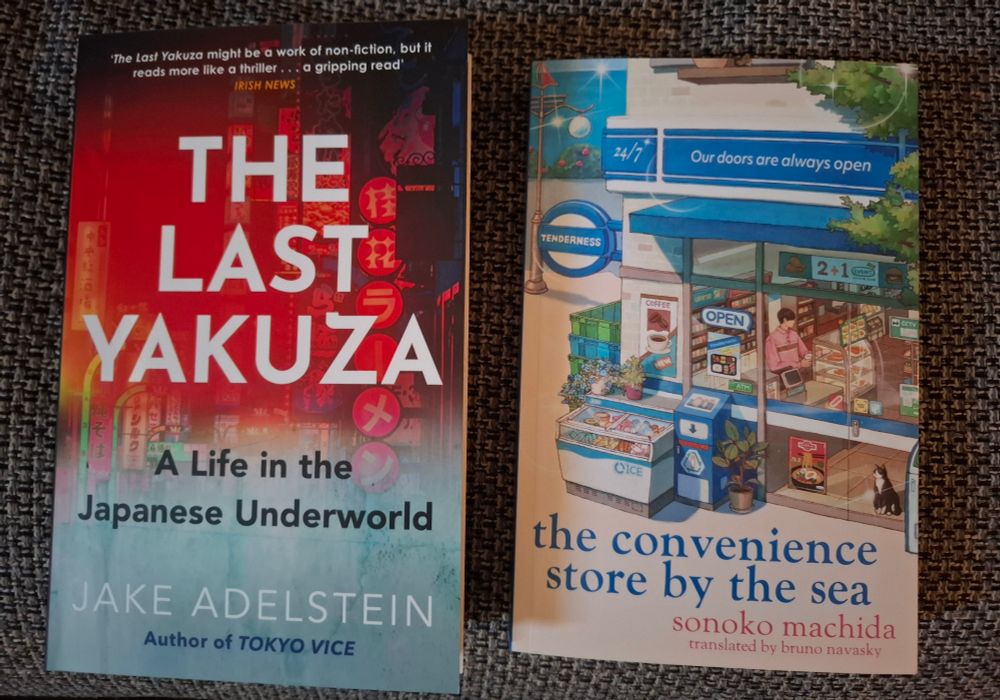 Two books: 'The Last Yakuza' by Jake Adelstein and 'the convenience store by the sea' by sonoko machida