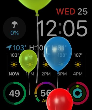 Apple Watch interface with balloons flying over it.