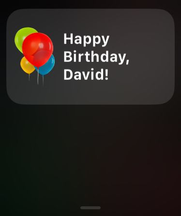 Notification that shows balloons to the left, to the right is text that reads "Happy Birthday, David!"