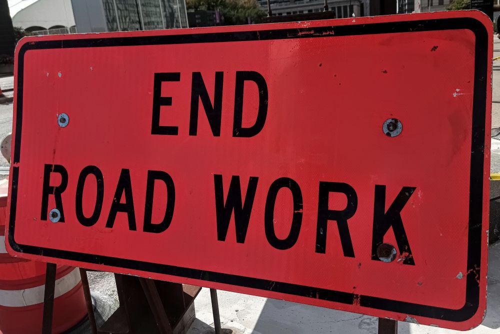 sign that says End Road Work