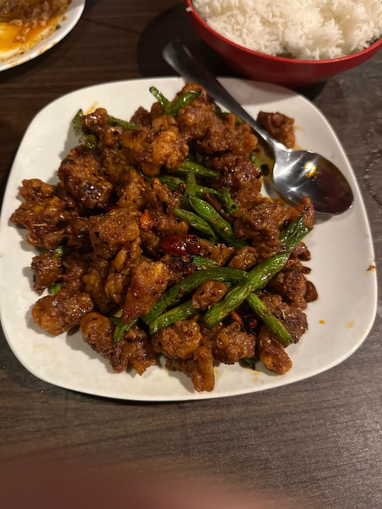 Breaded, deep fried, and stir fried chicken chunks and green beans. Made with Szechuan chilis and peppercorns