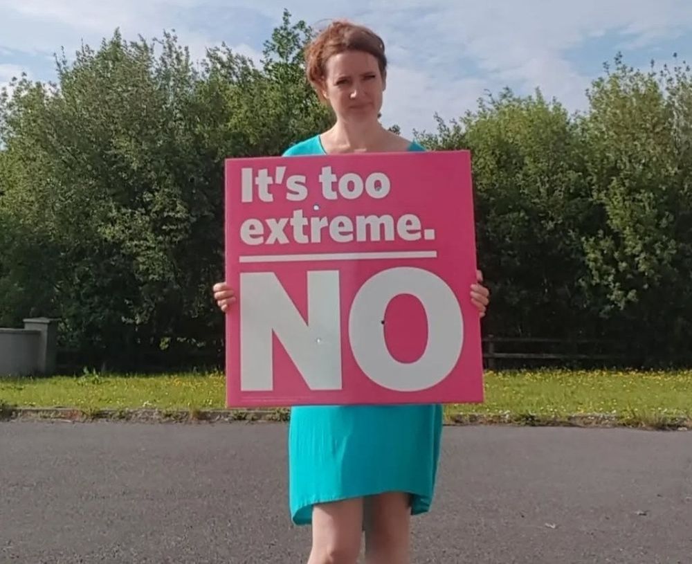"It's too extreme. No" sign from Repeal 