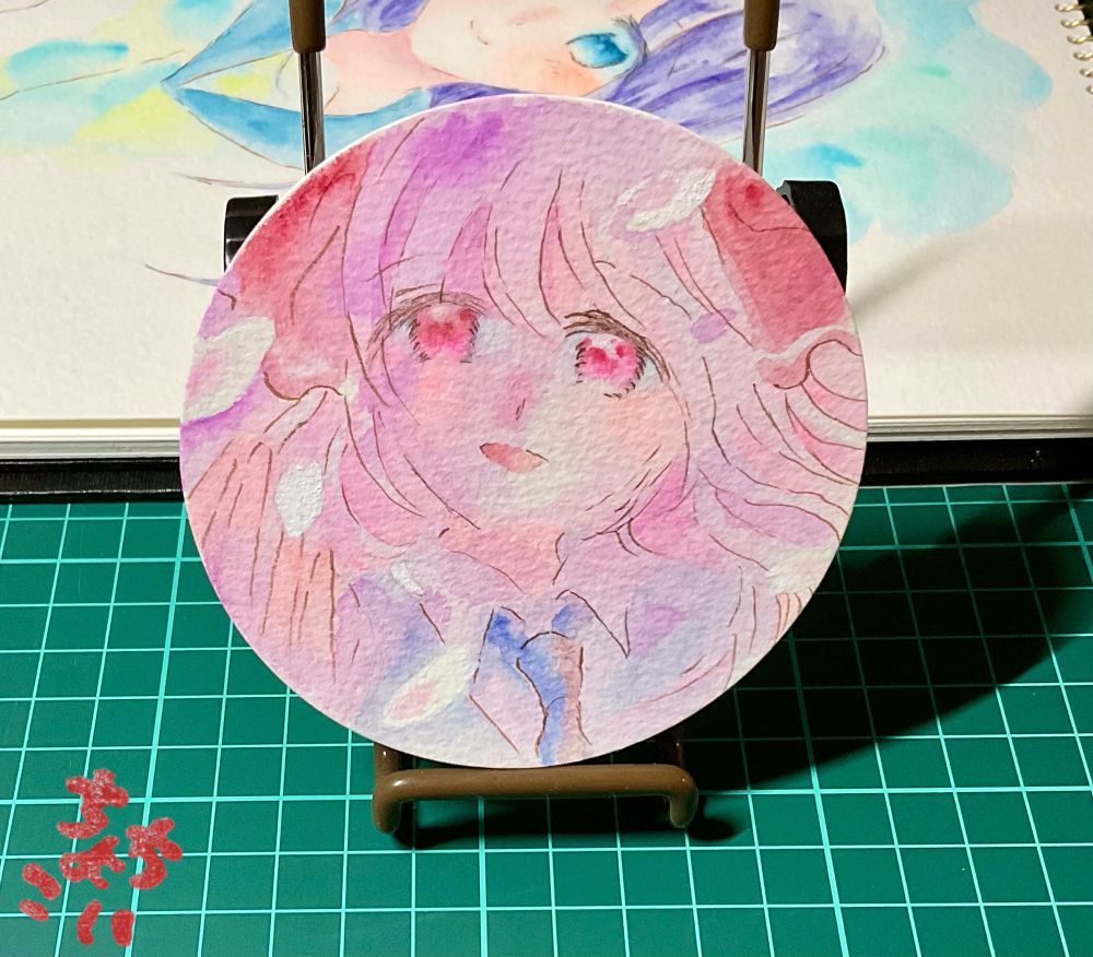 透明水彩で描いた女の子と桜の花びらの絵が写っています。