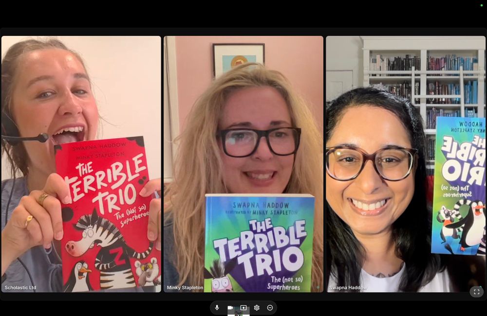 Screengrab photo of Rosie from Scholastic, Minky Stapleton and me all holding up copies of The Terrible Trio