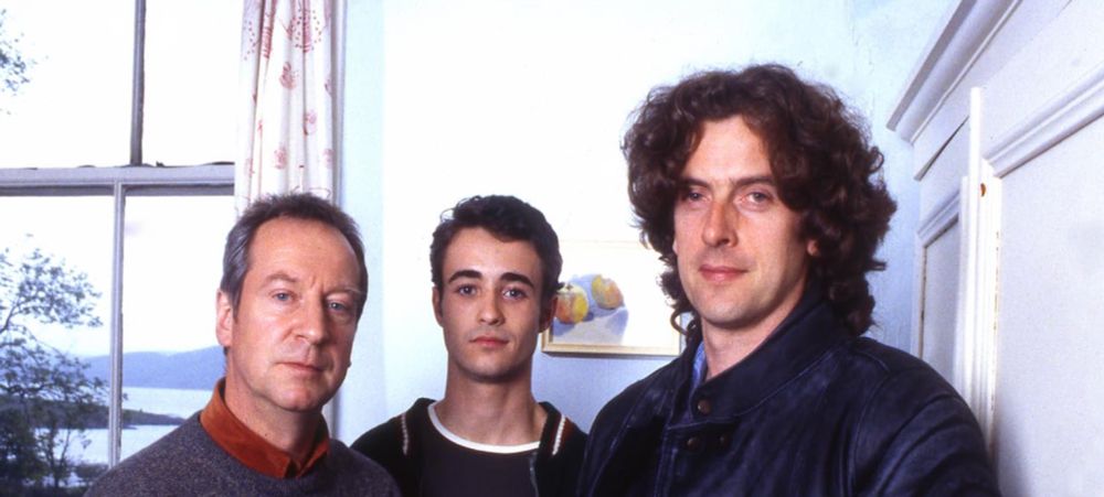 Bill Paterson, Joe McFadden, and Peter Capaldi in The Crow Road (1996). Peter has a large head of curly dark hair