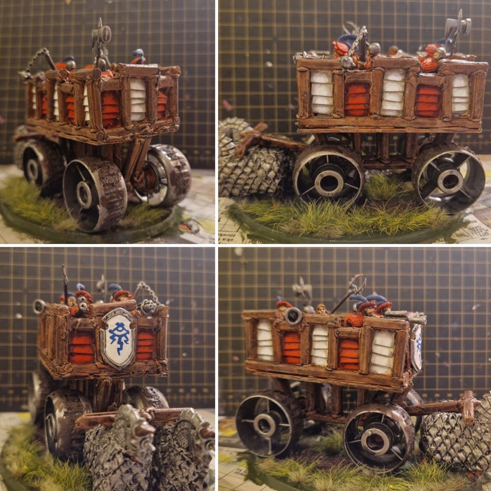 The war wagon trampling a grassy field. Pulled by two armored horses.