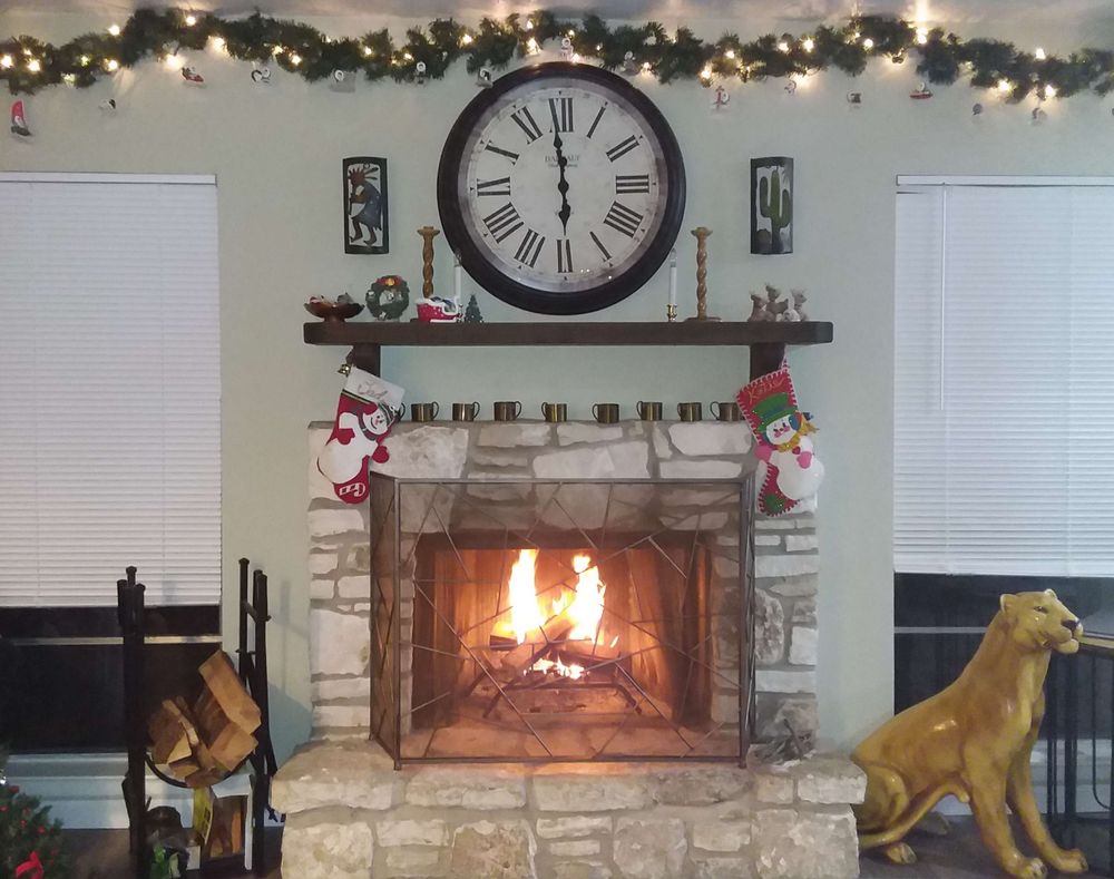 Photo of our fireplace with a cheerful fire