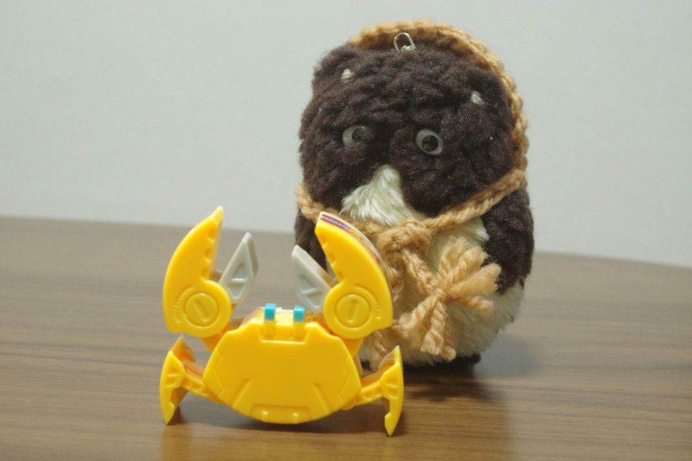 カニ缶がカニにトランスフォームした不服そうな狸