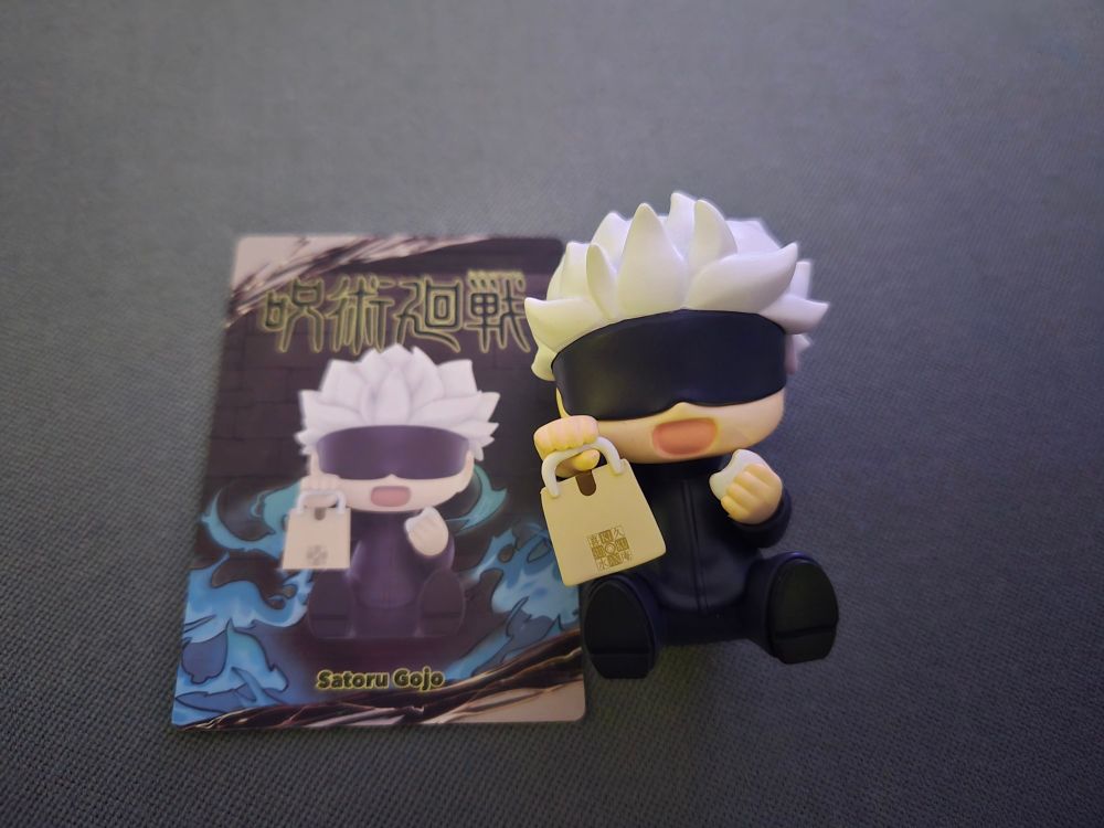 A small Gojo figure from Popmart. 