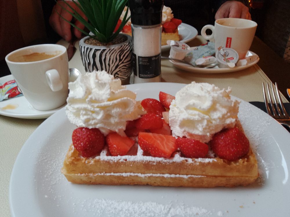 Waffle with lashings of strawberry and cream