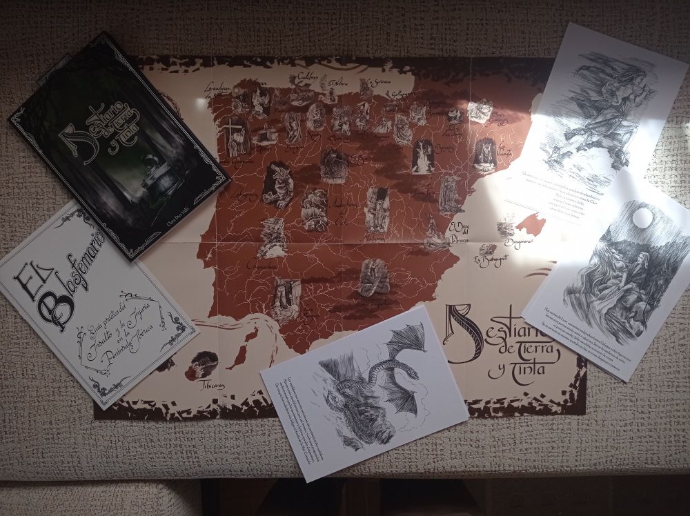Rewards from the fundraiser:
A map of Iberian península with myth's locations, the bestiary, the blasphemarium (a dictionary of olden swearwords) and some beautiful printings.