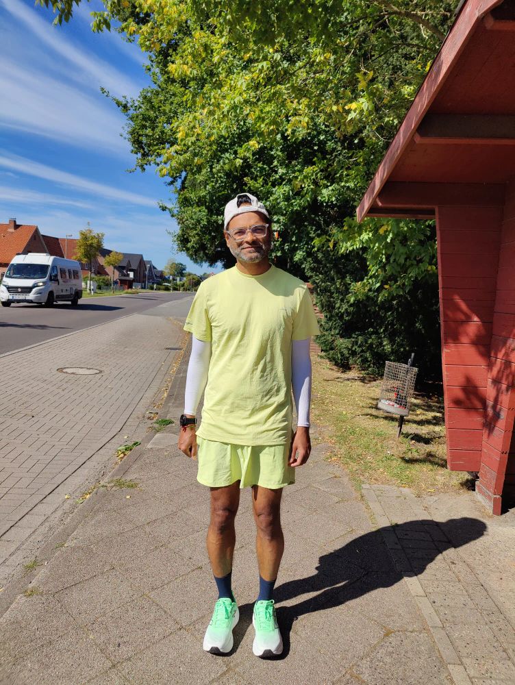 Santosh in running gears ready to run third half marathon in 2025.