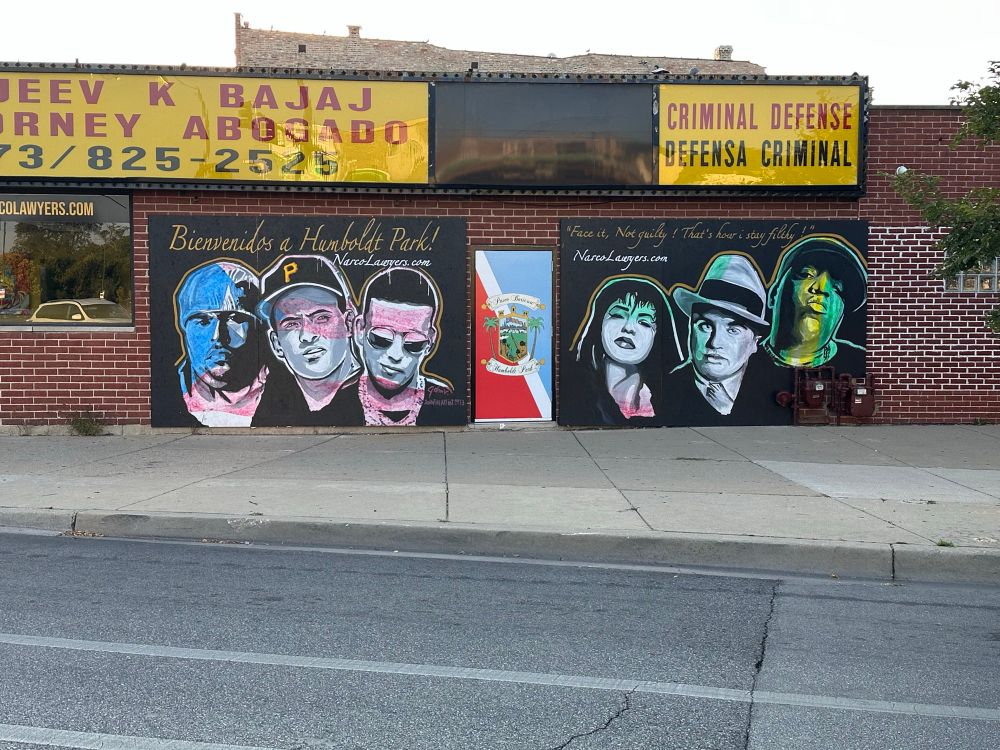 Mural featuring Roberto Clemente, Daddy Yankee, Selena Quintanilla, Al Capone, Biggie Smalls, and some guy I don’t know on the left, I’m sorry

Text: Bienvenidos a Humboldt Park

“Not guilty, that’s how I stay filthy”