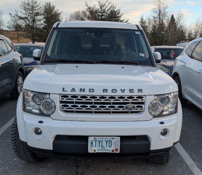 Car with KTYLYD license plate ("Katy Lied")...