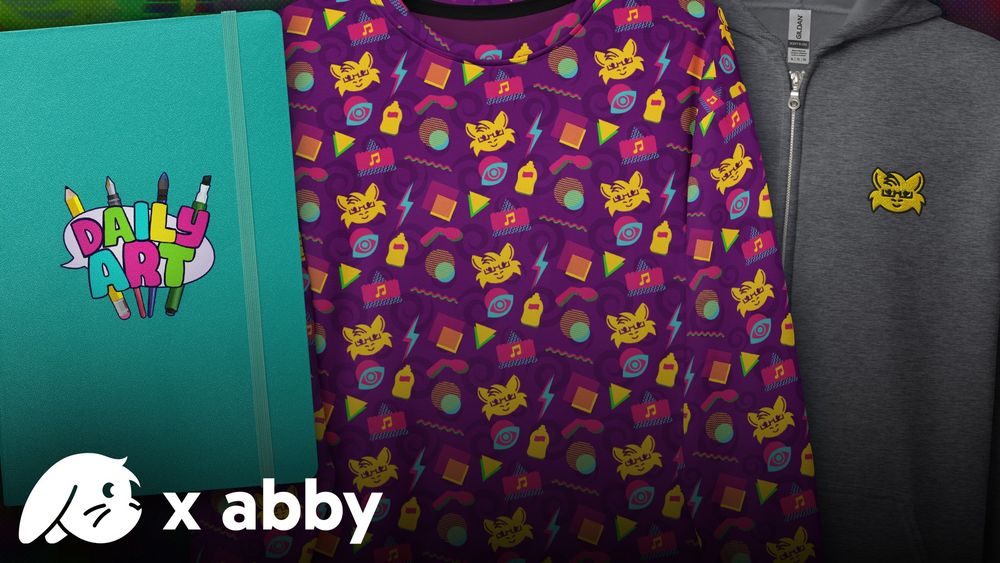 product images of a collaboration between the merch company floofee and the content creator "abby". contains a "daily art" journal, patterned sweatshirt, and embroidered zip up hoodie