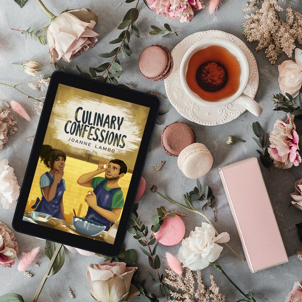 Cover of Culinary Confessions on iPad surrounded by different colored macarons and cup of tea