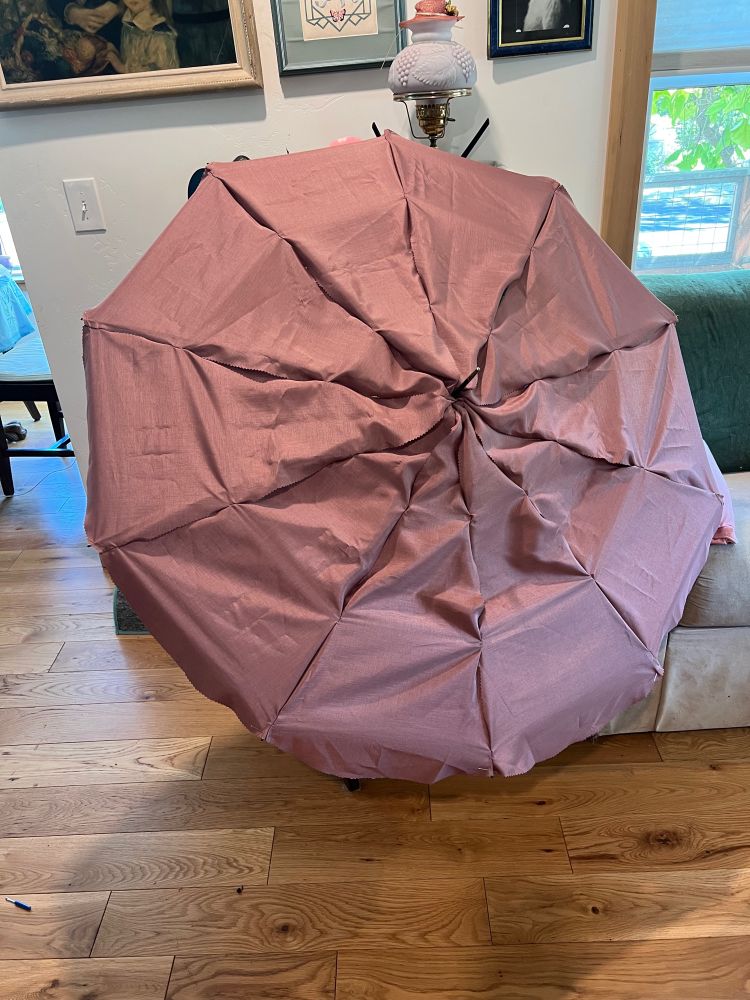 The ten panels from before, before I put the designs on them. They are stretched to fit the parasol frame. This was my final test of the shape