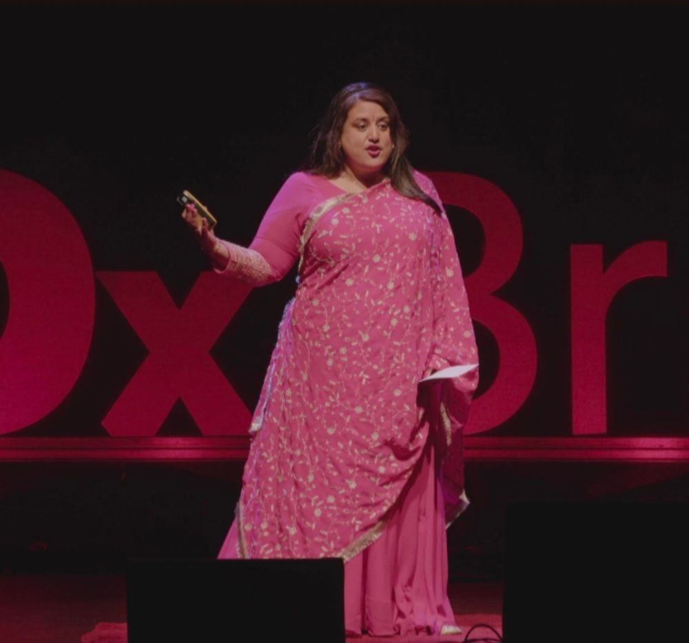 Mo on stage at TEDxBrighton 