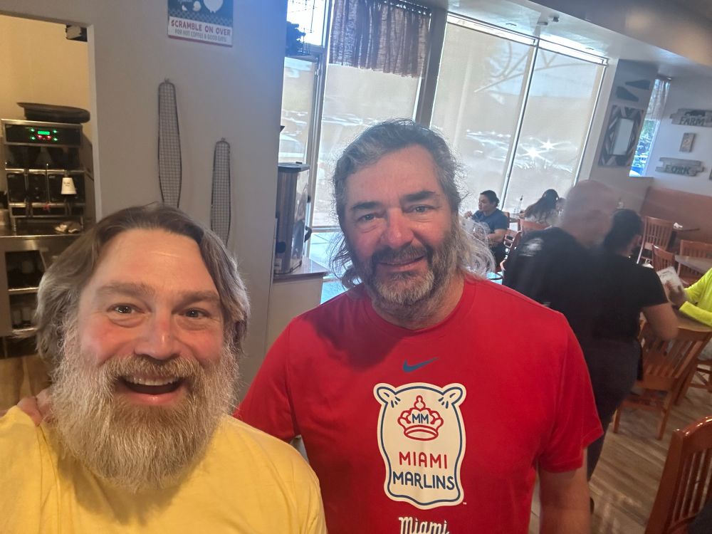 Andy and Sam at breakfast talk baseball. 