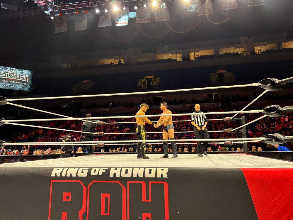 Tony Deppen and Action Andretti shake hands before their Ring of Honor match. 