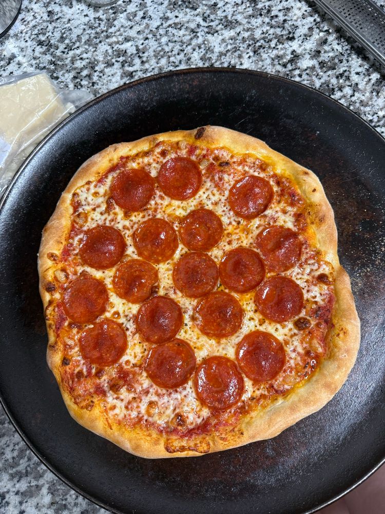 My second most recent pizza with just a really good shape to it, and a perfect crust. 