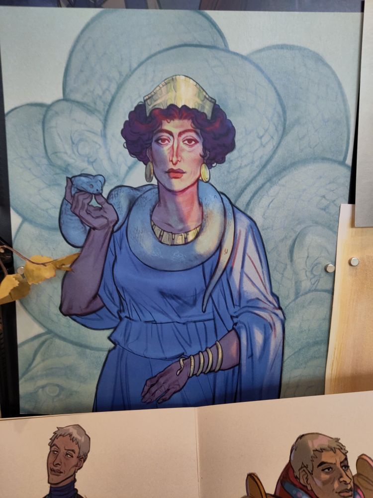 A picture of my print of an Etruscan inspired woman holding a snake 