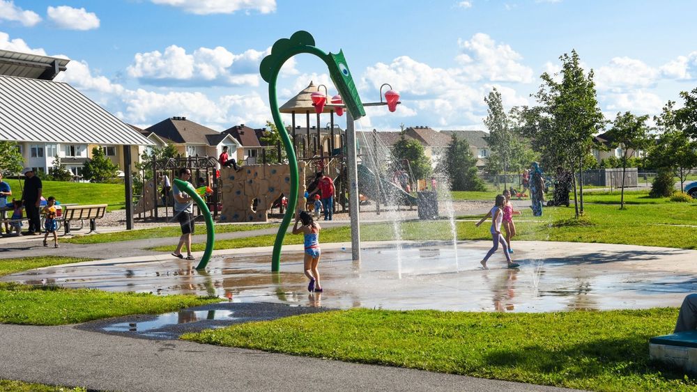 Children playing at a City of Ottawa Splash Pad.