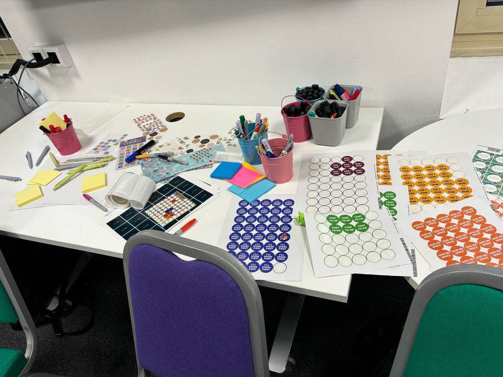 Image of a table full of stickers and labels 