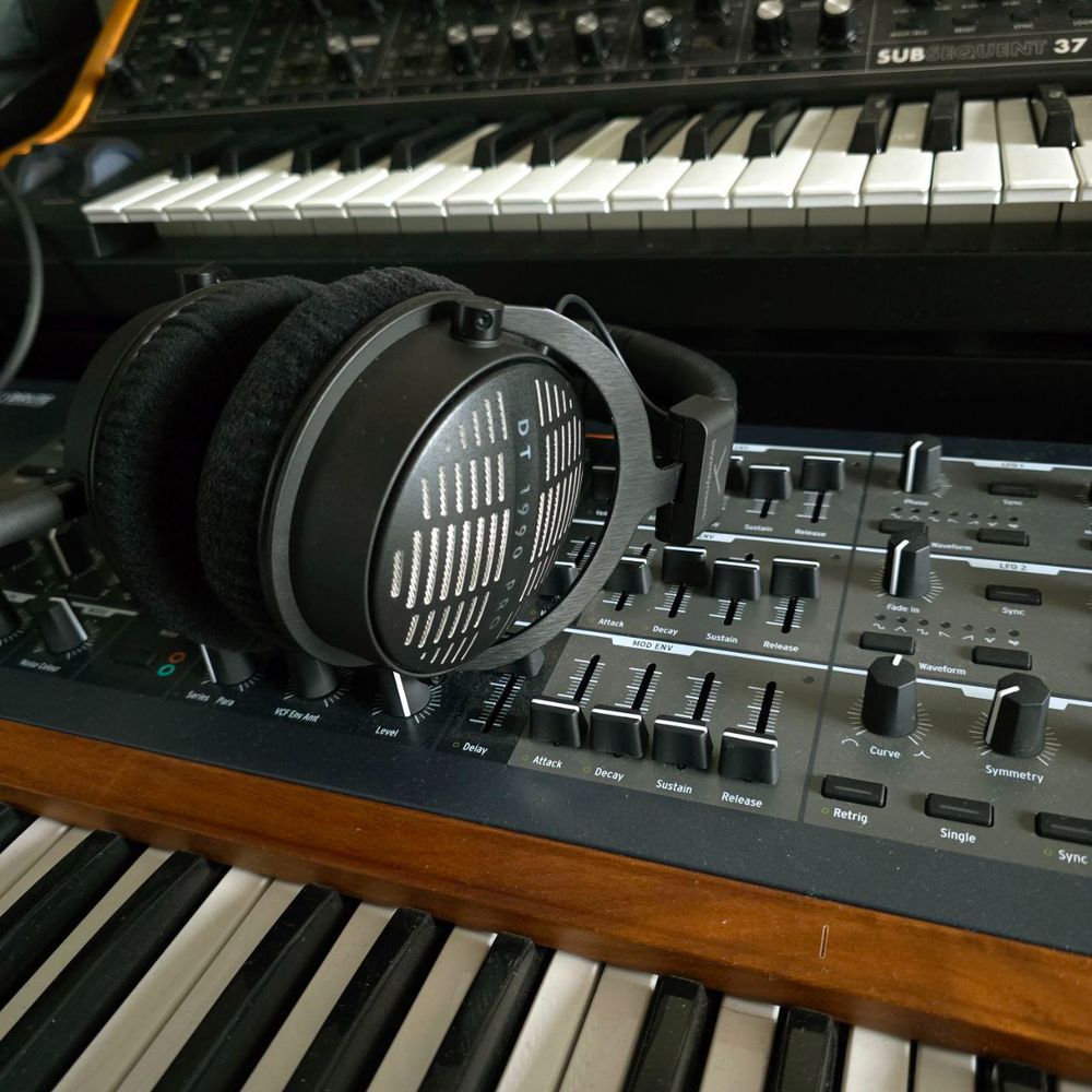 beyerdynamic headphones laying on a synthesizer