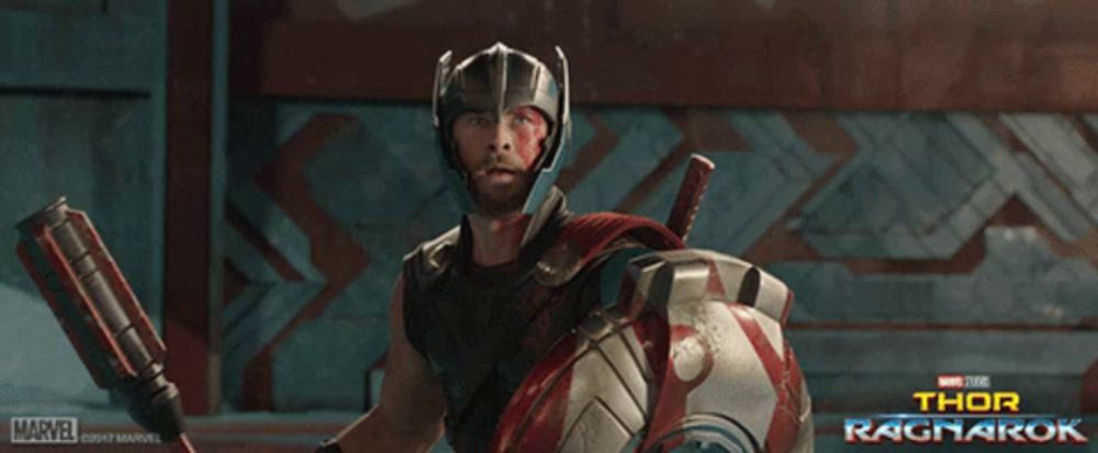 a movie poster for thor ragnarok shows a man in armor