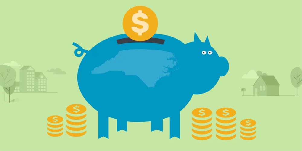 picture of blue piggy bank with coin