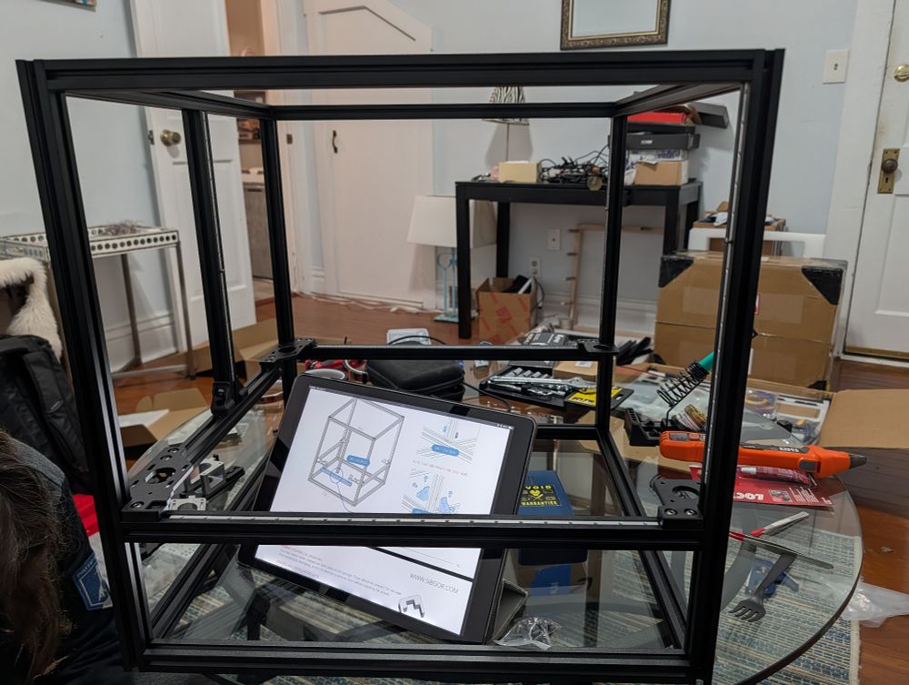 The front and rear drive lower plates and associated hardware are in place 