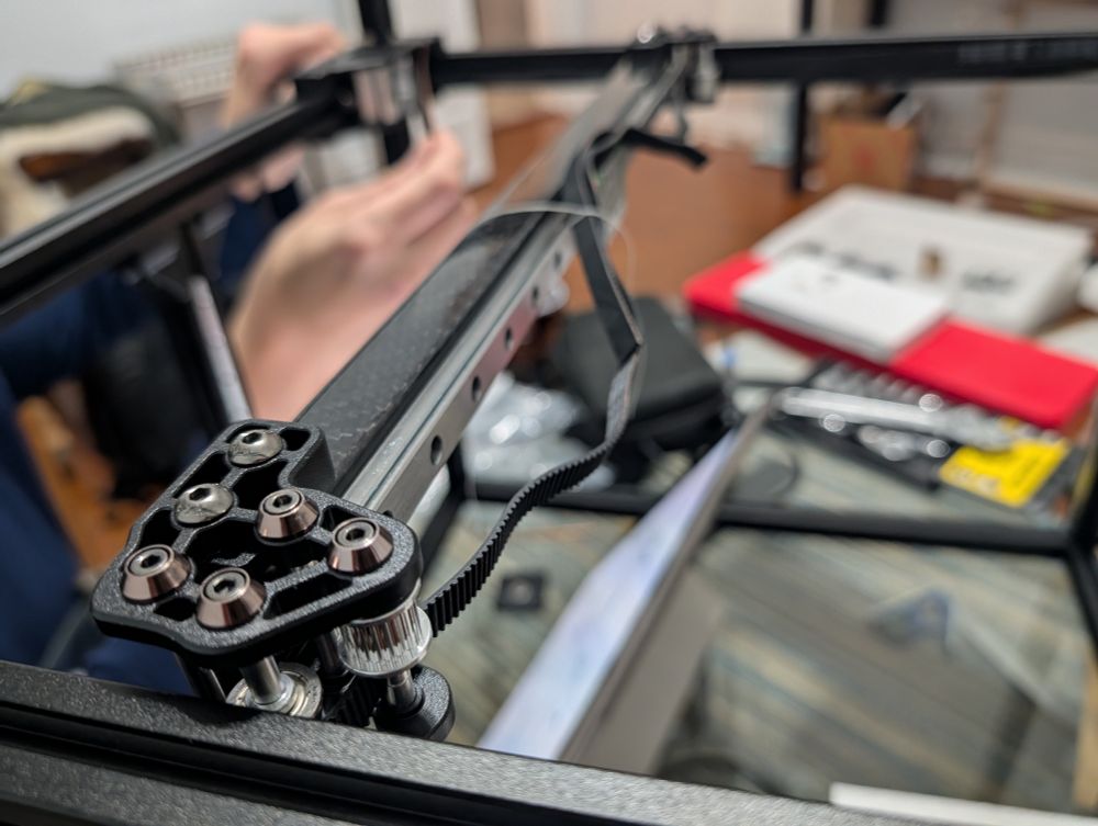 A view of gantry showing one belt is loosely installed 