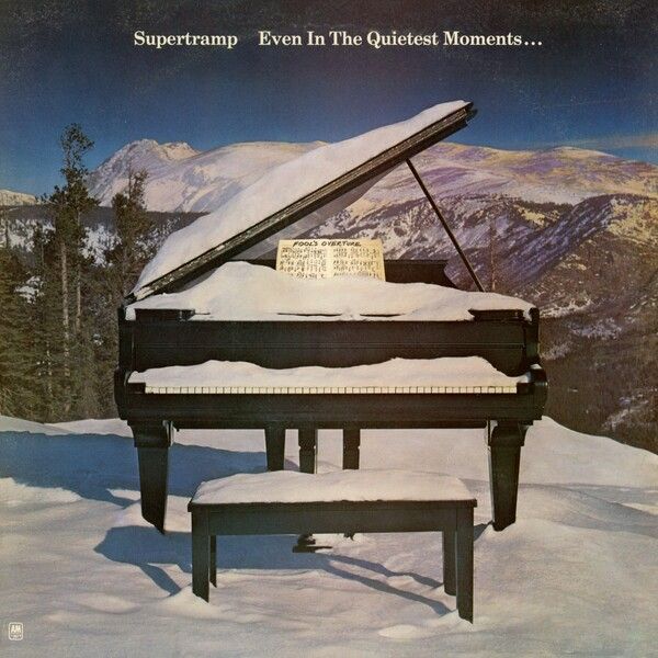 Cover of Supertramp album, a snow-covered grand piano on a mountaintop. 