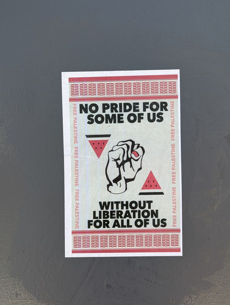 Sticker on the wall that reads "No Pride for Some of Us... Without Liberation for All of Us" and Free Palestine 
