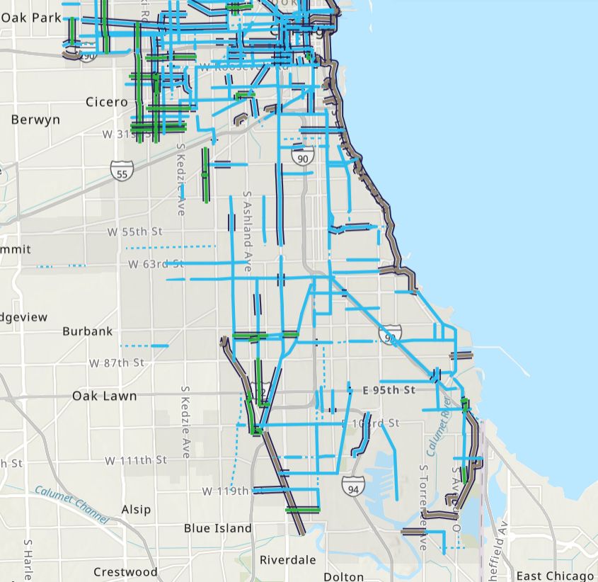 A screenshot of CDOT's interactive map of bike infrastructure on the South Side of Chicago. The map is bounded roughly by the Calumet Channel to the south, Harlem Avenue to the west, I-290 to the north, and Lake Michigan to the east. Lots of greenways and protected bike lanes are visible north of I-55, but there is very little aside from painted lanes south of that. Off-street bike trails are visible along the lakefront, on which the Lakefront Trail extends down to South Shore, as well as the Major Taylor Trail on the far South Side and a few sections of trail near Wolf Lake on the far Southeast Side.