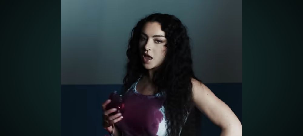 Charli xcx with wine stained shirt from video 360.