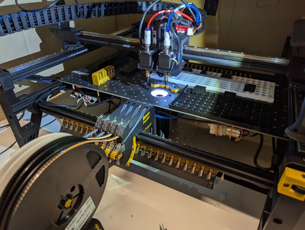 Opulo pick and place machine loaded with the LEDs and drivers. 