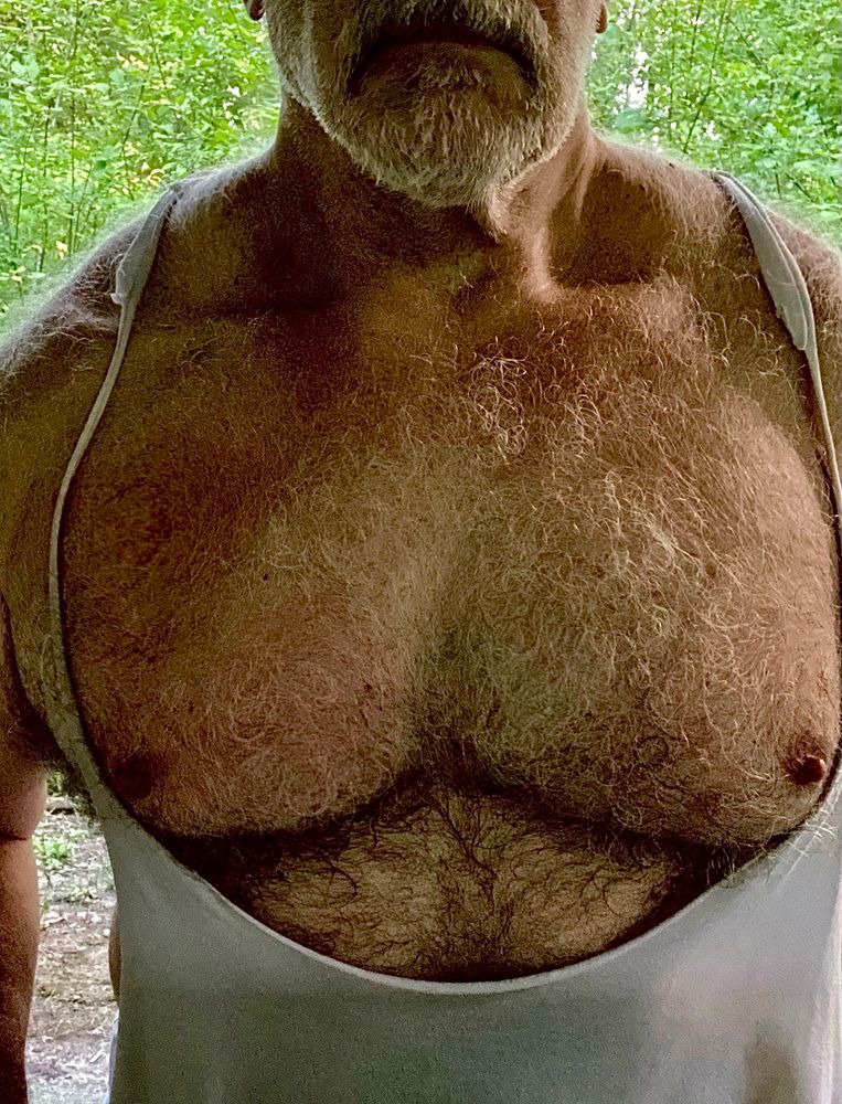 Furry chest in a top with and extremely deep scoop.