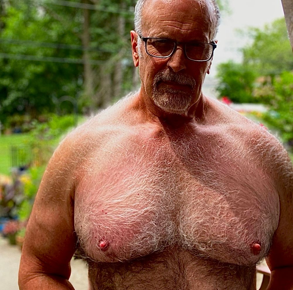 Redundant furry, bare chest selfie.