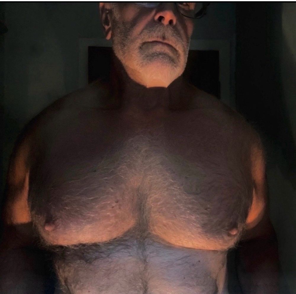 Bare chested with fur and up lighting